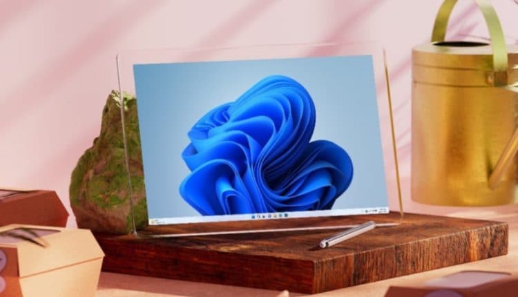 A glass computer running Windows 11