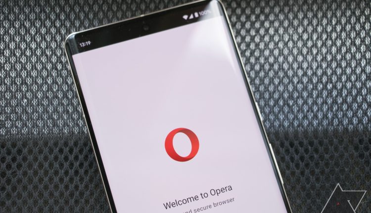 A Google Pixel 7 Pro on a mesh background with Opera logo displayed on its screen