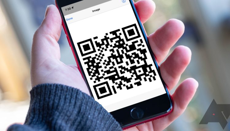 iphone se 2022 with a qr code on the screen