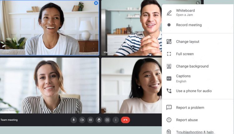 Four people on a Google Meet call with an options menu open. 