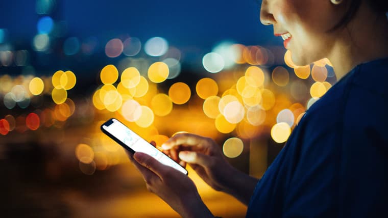 Woman holding a phone