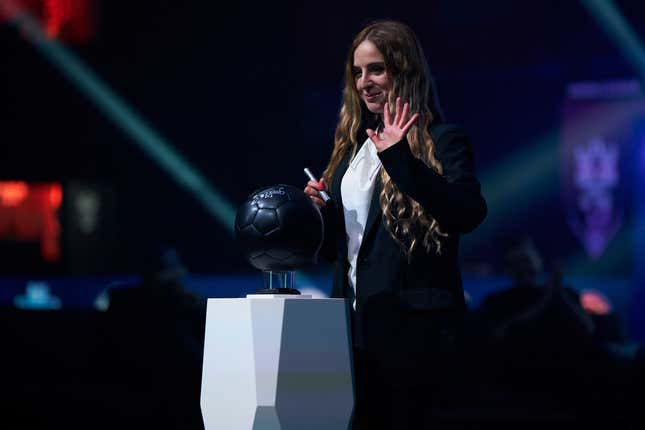 Mayichi appears at an event for the Queens League.