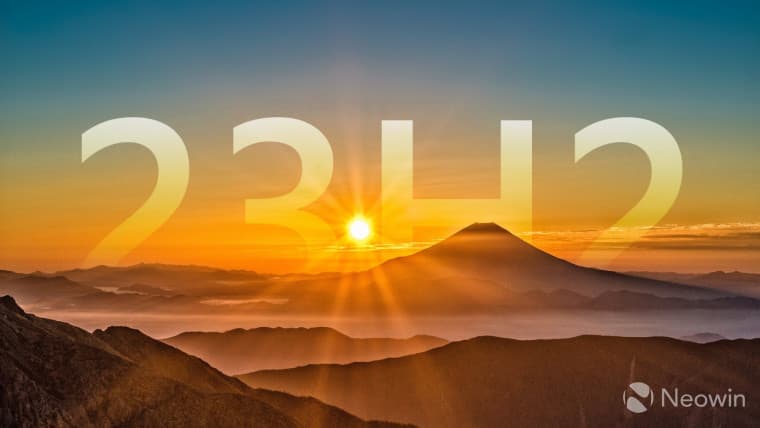 A picture showing the sun rising behind a mountain with a large 23H2 script