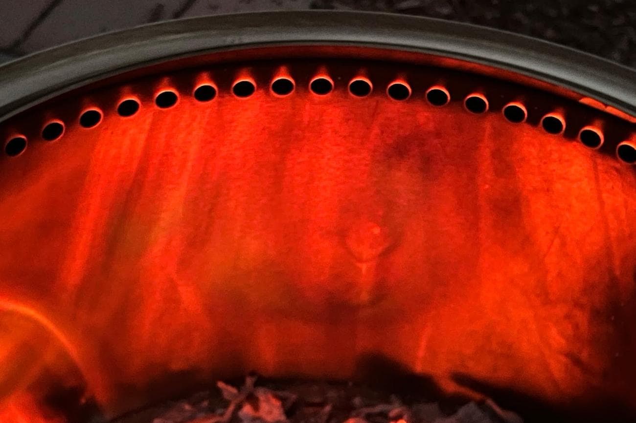 The holes in the top spit small flames out during the burn on the Solo Stove Bonfire 2.0