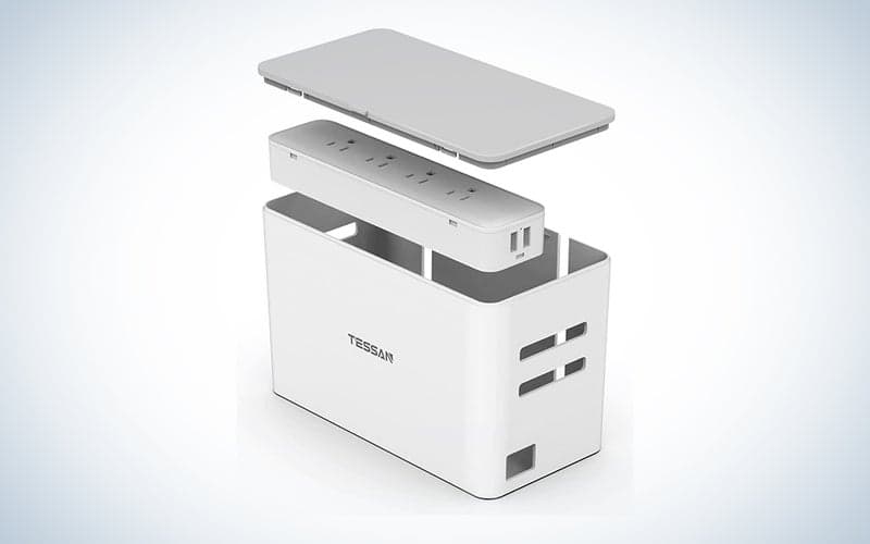 A white cable management box on a blue and white background.