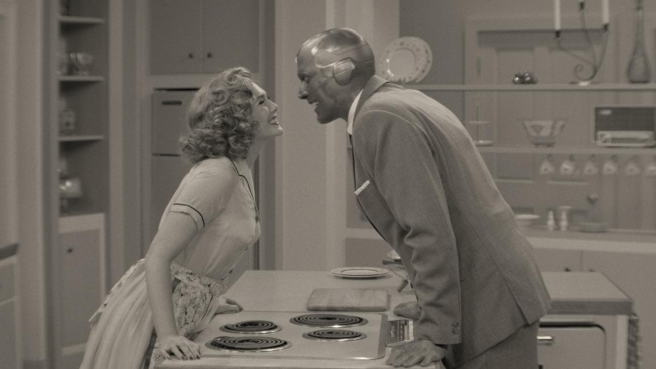 Two people on a 1960s black and shite sitcom.