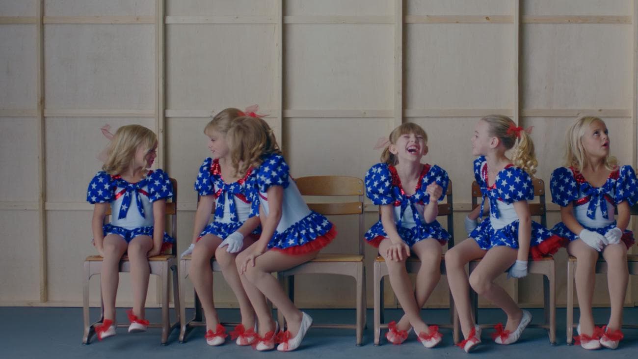 A group of girls all dressed as JonBenet Ramsay.