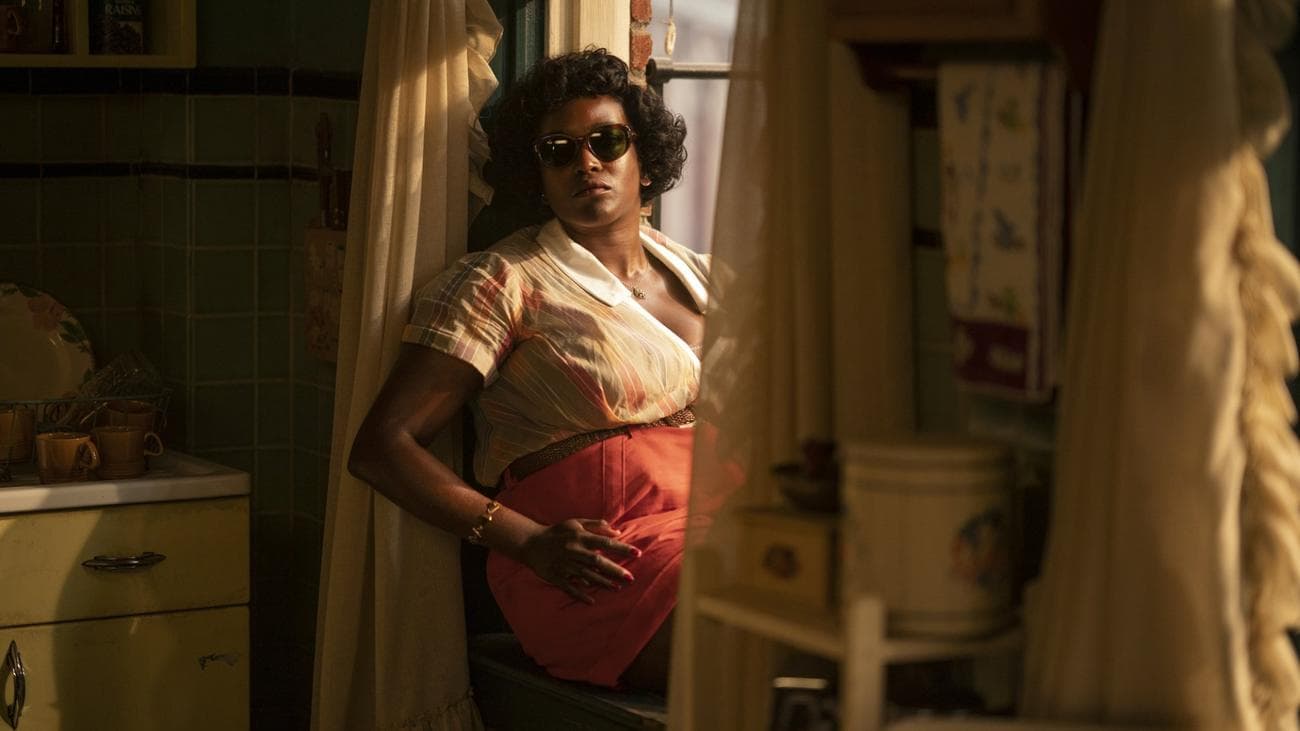 Wunmi Mosaku sits in a window on 