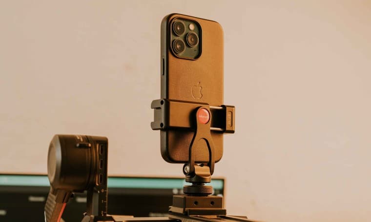 Apple iPhone placed on a tripod stand