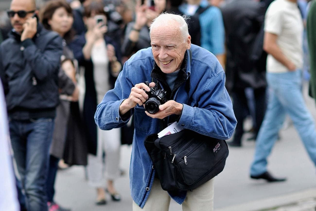 Photographer Bill Cunningham working during Paris Fashion Week Womenswear Spring/Summer 2014