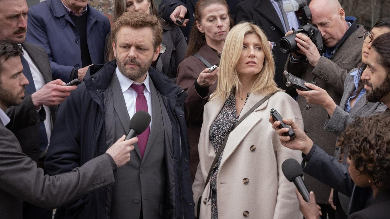 Sharon Horgan and Michael Sheen are surrounded by press in the show "Best Interests"