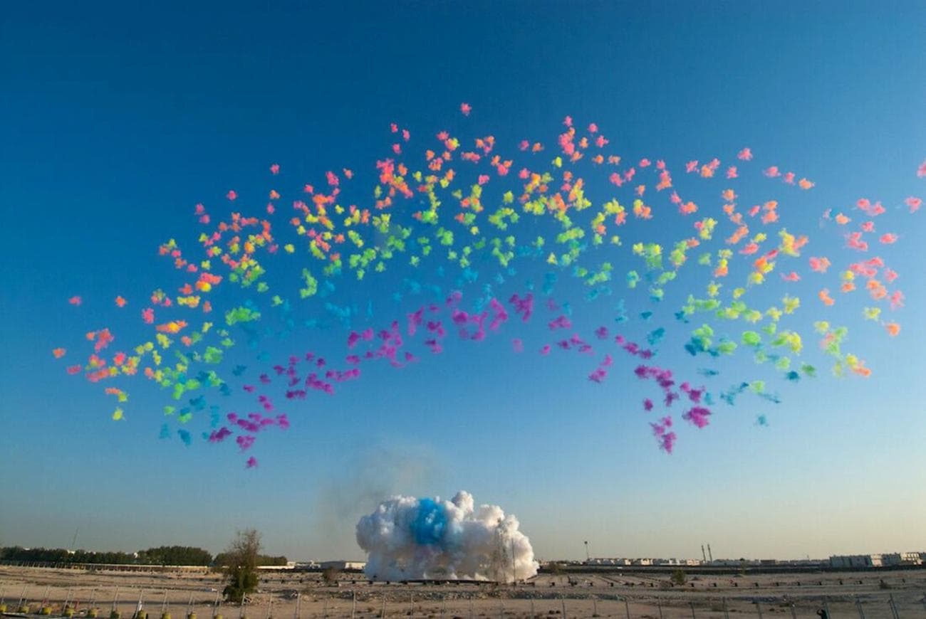 A rainbow made of explosions by the artist Cai Guo-Qiang