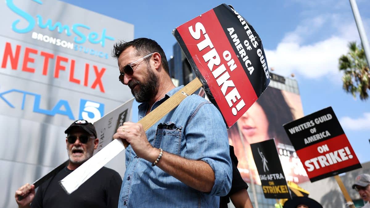 A group of writers picket outside Netflix