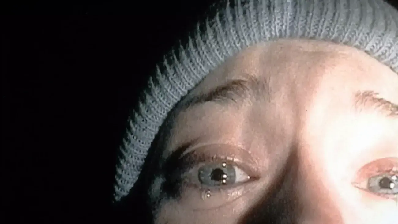 Heather Donahue stares into the camera in "The Blair Witch Project."