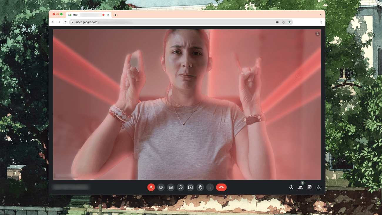 Άτομο που χρησιμοποιεί κινούμενες αντιδράσεις στο Google Meet