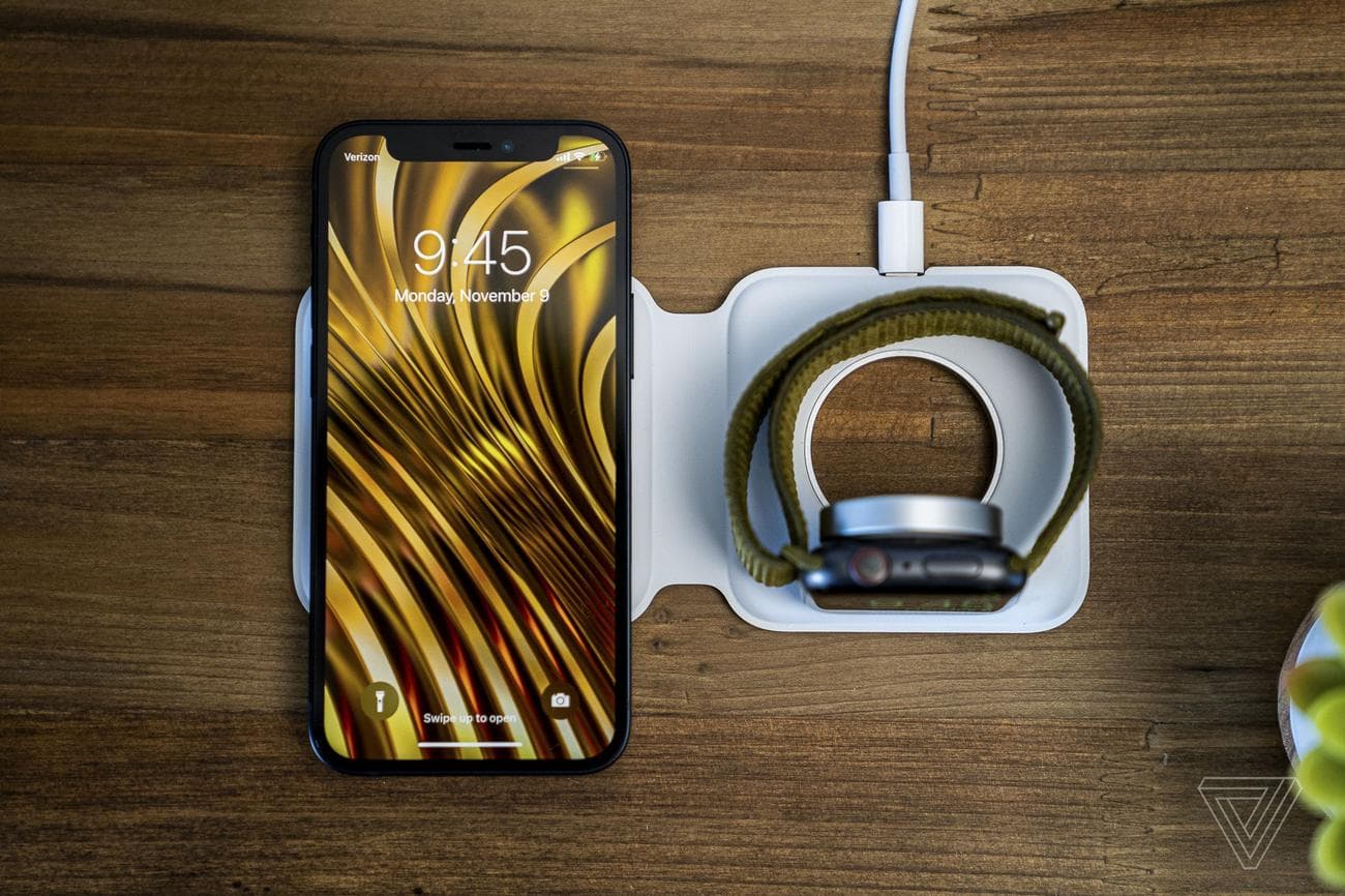 Picture of Magsafe Duo charger with phone and Apple watch on it.