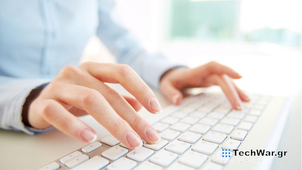 Person typing on keyboard