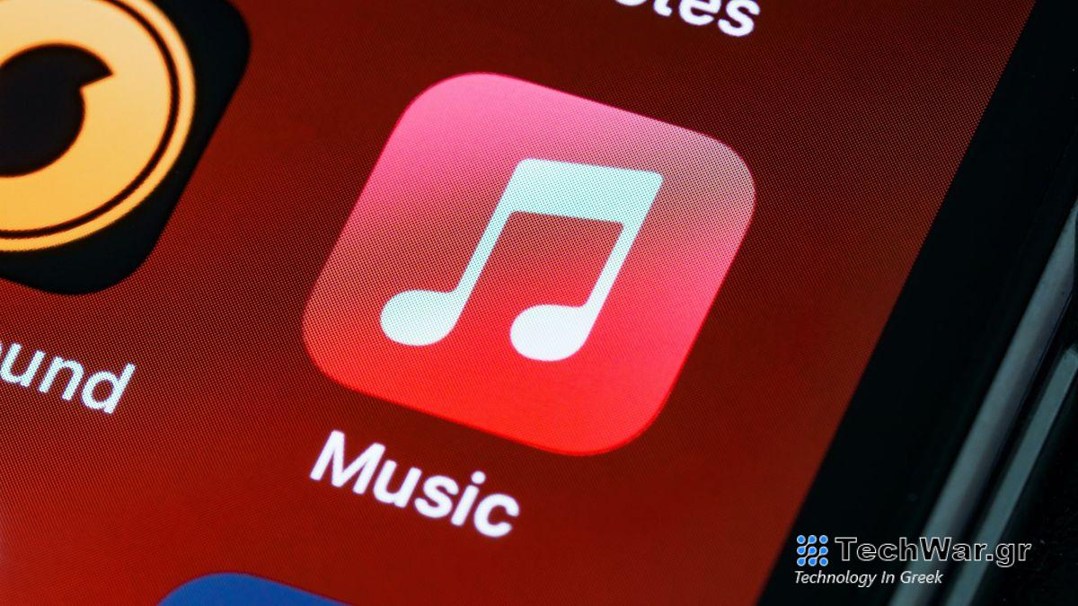 The Apple Music app icon against a red background on an iPhone.