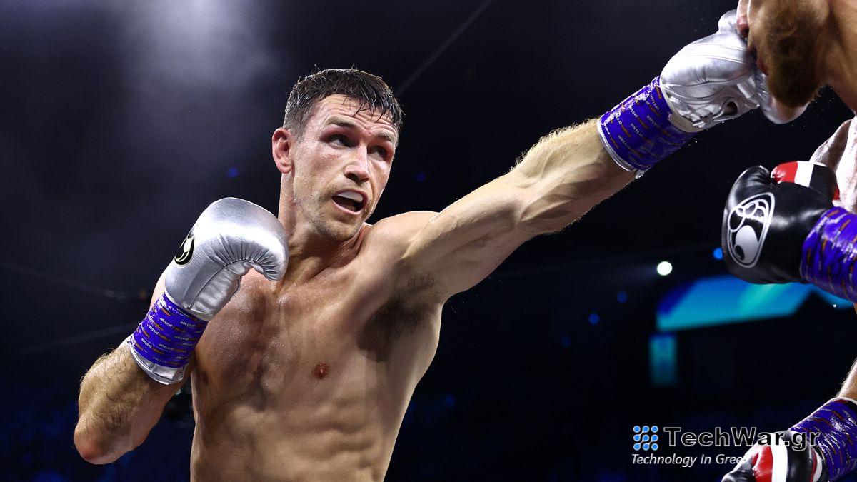  Callum Smith, in red and white shorts and silver boxing gloves, punches an opponent ahead of the Beterbiev vs Smith live stream