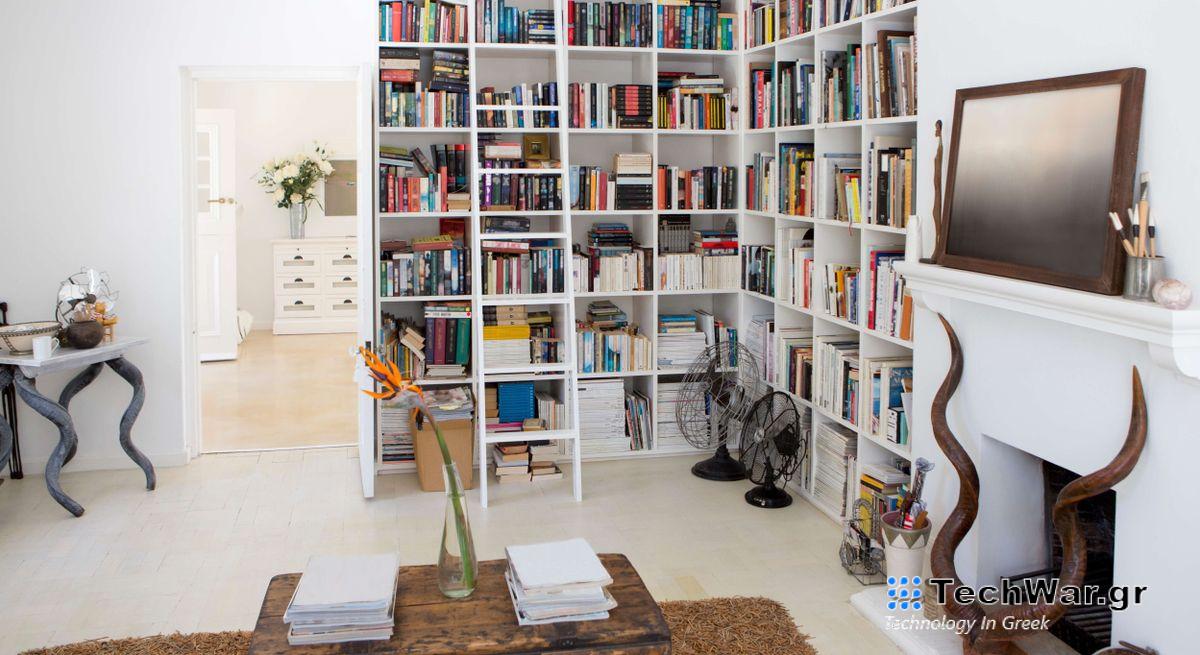 Large bookshelf area in a comfy living room