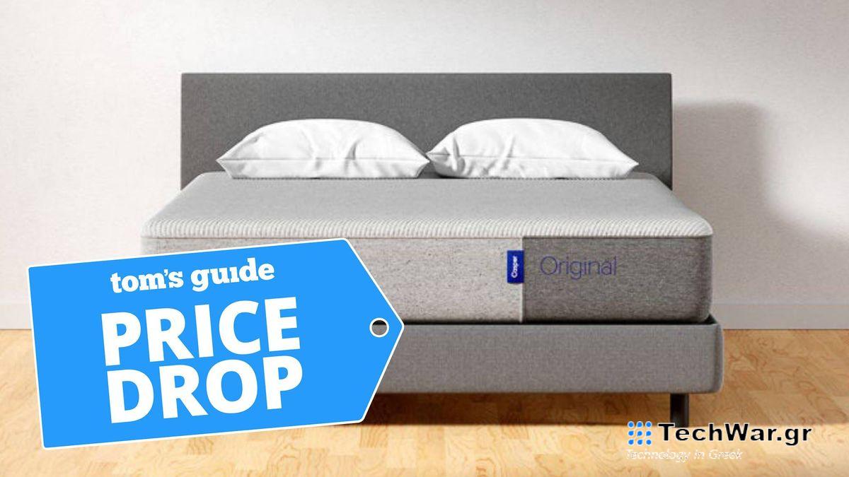 Image shows the Casper Original mattress in a box on a grey bed frame with a blue Price Drop sales badge overlaid in blue