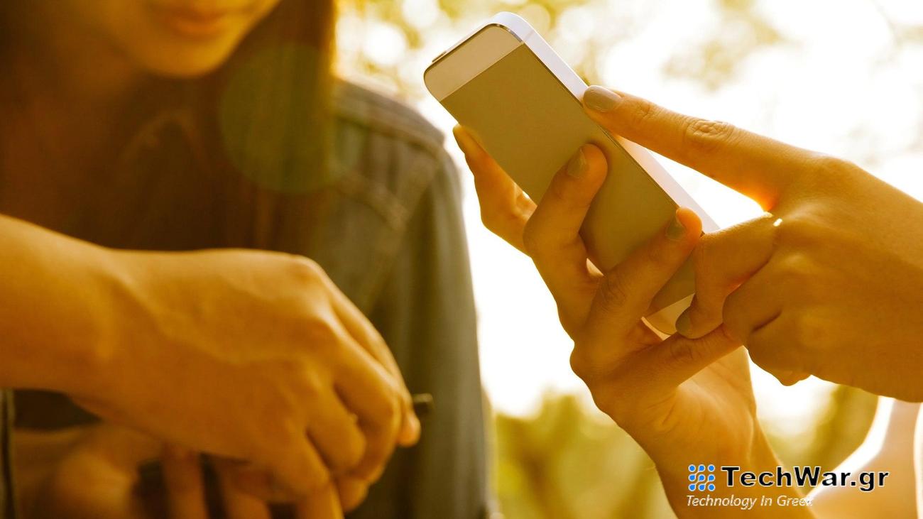 Close up of teens with smartphone