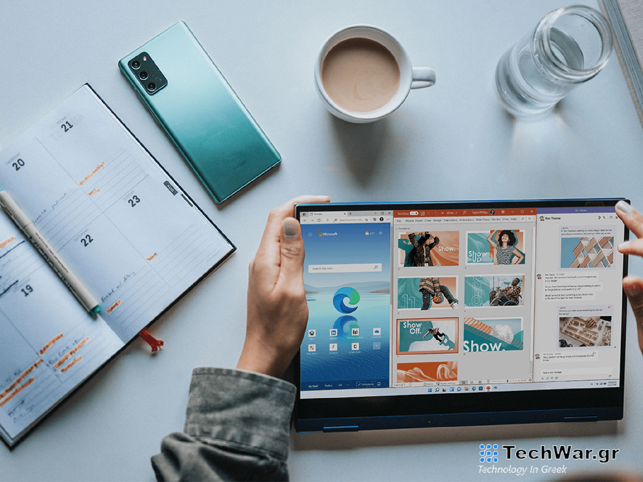 A person working on a Microsoft website at a desk.