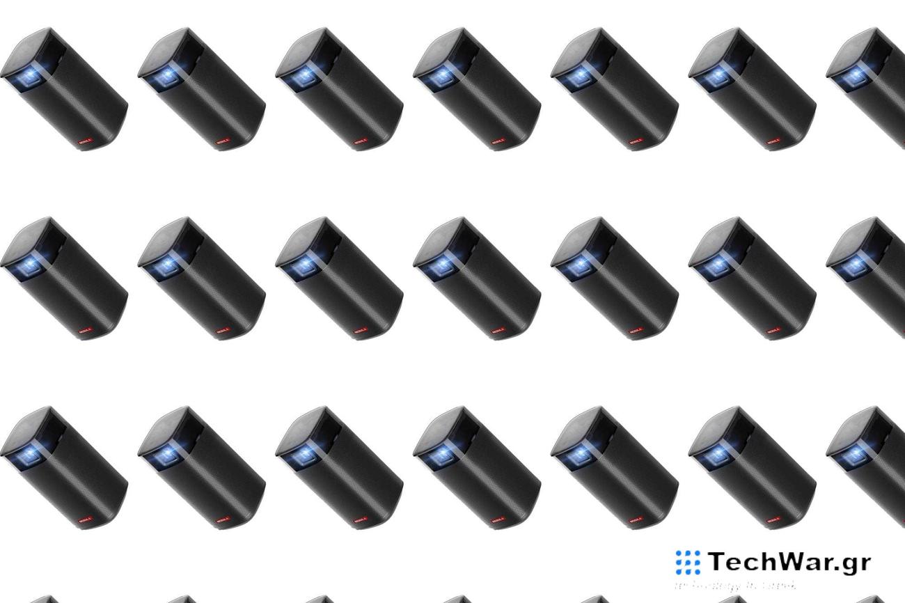 A black Anker Mini projector in a pattern on a plain white background