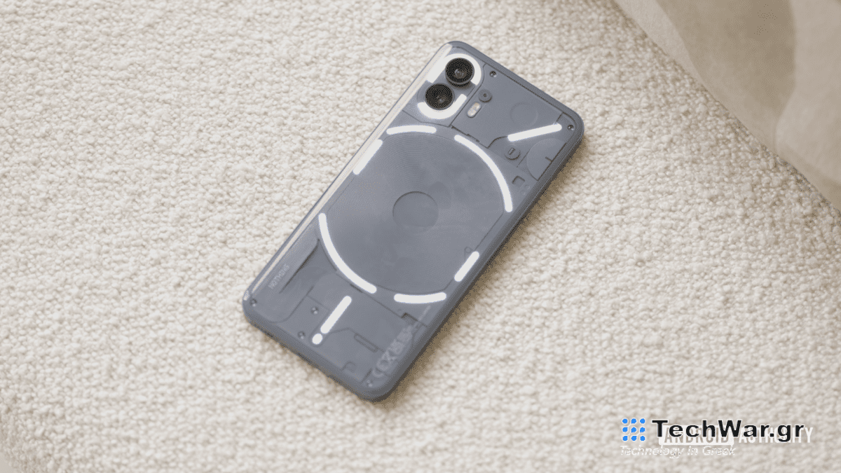 Nothing Phone 2 on couch with glyph lights enabled