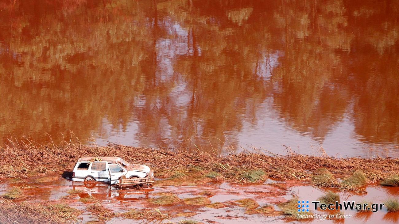 Abandoned car in aluminum red mud spill
