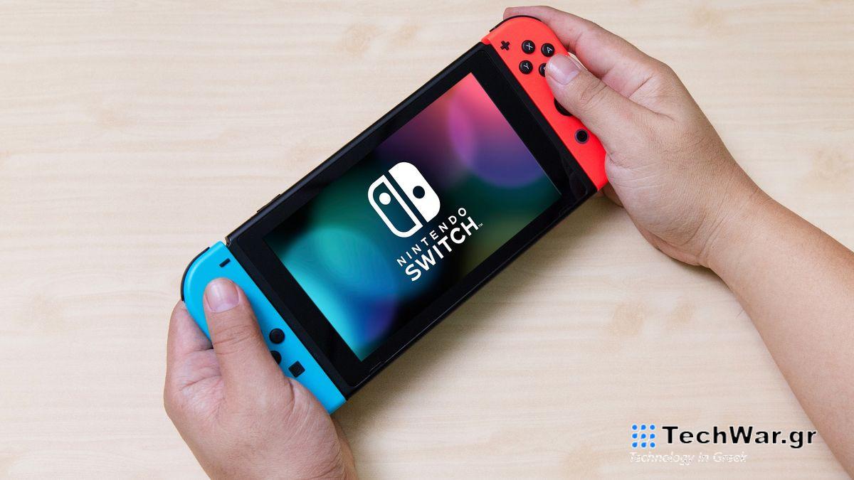 Man holding Nintendo Switch