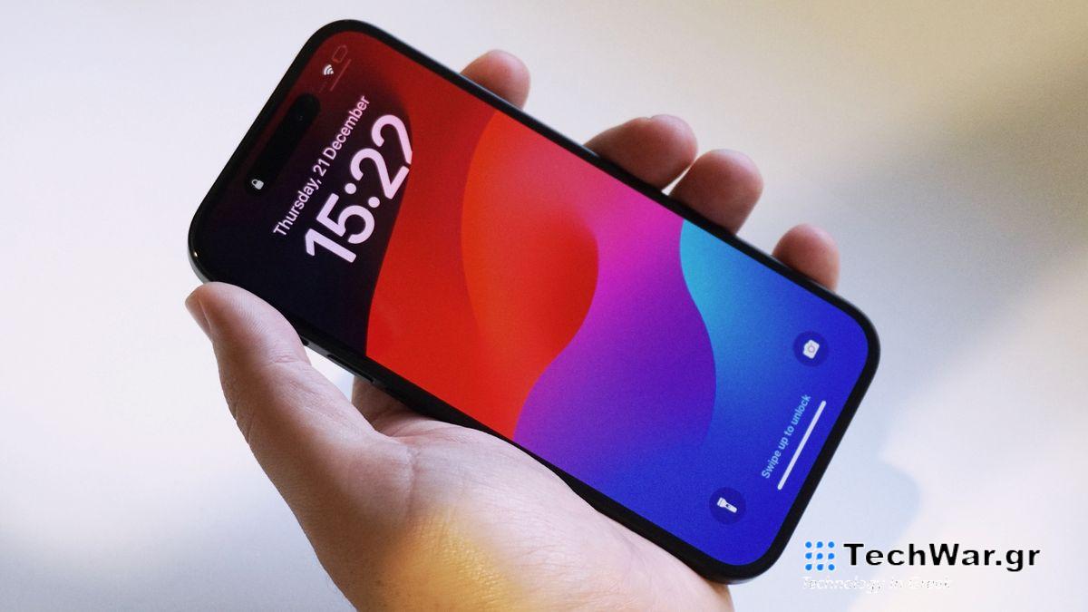 iPhone 15 front handheld angled