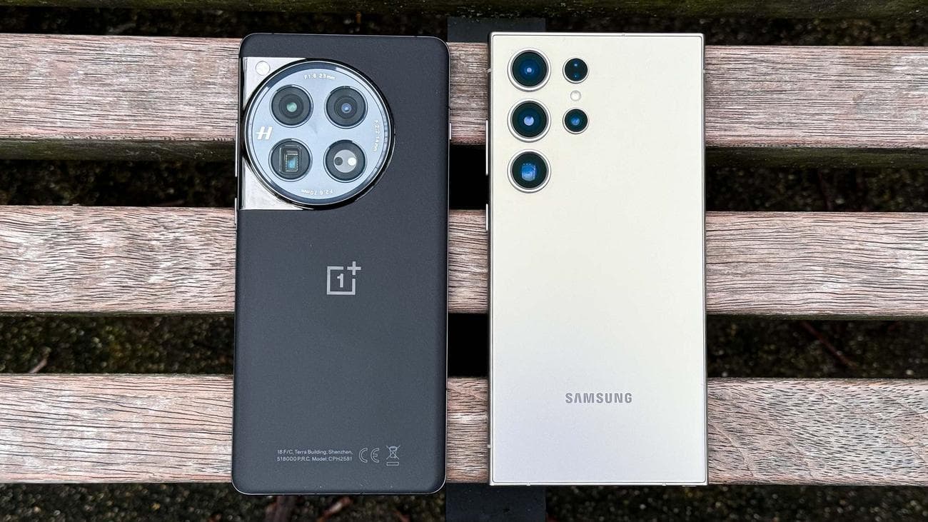 OnePlus 12 and Samsung Galaxy S24 Ultra from the back on a wooden bench