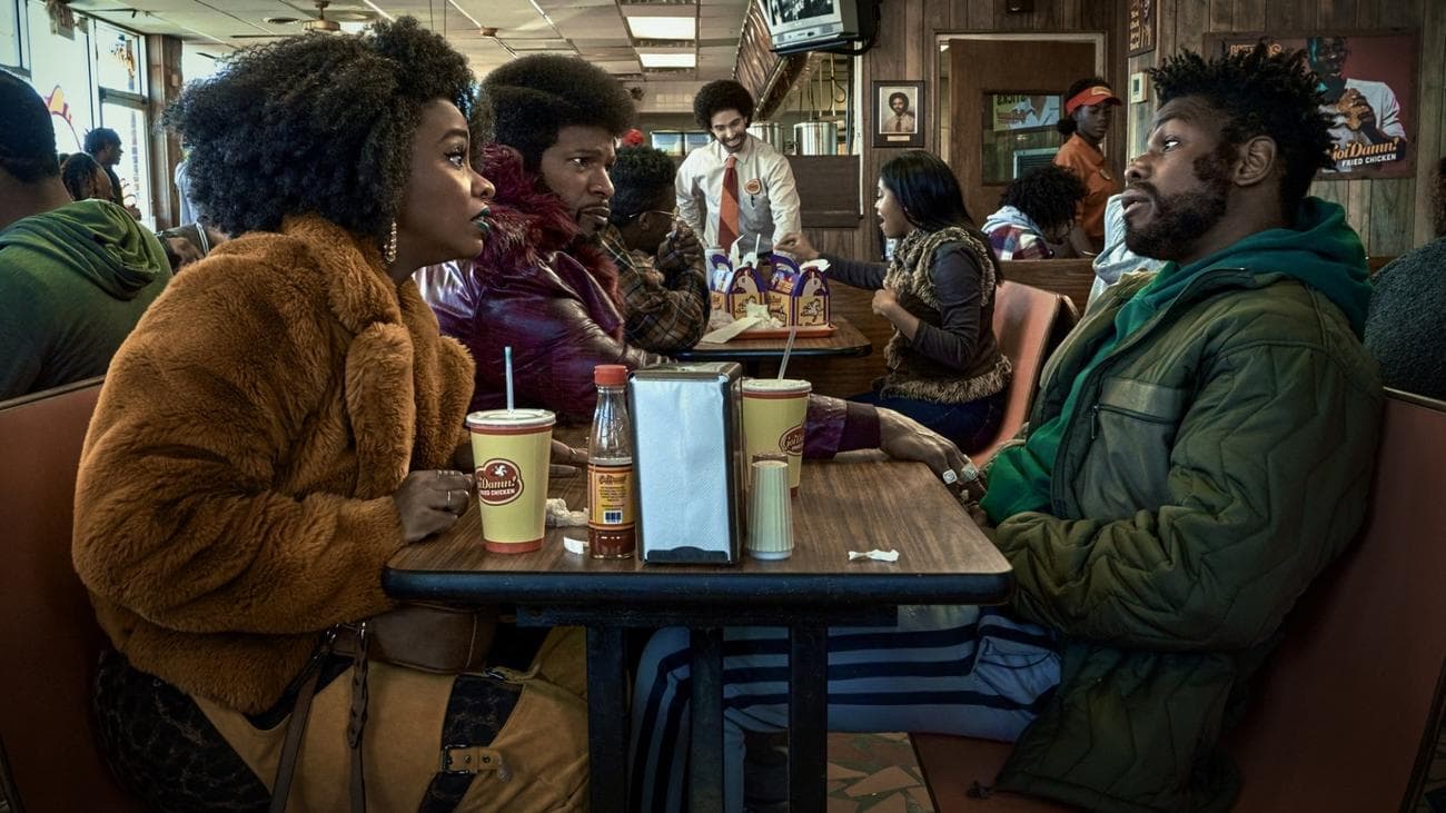 Teyonah Parris, John Boyega, and Jamie Foxx in "They Cloned Tyrone."