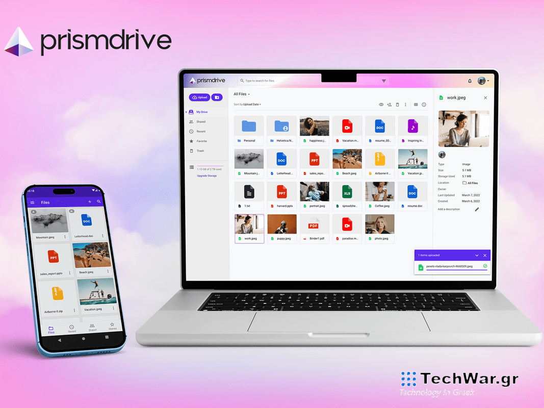 A laptop and phone with Prismdrive cloud storage pulled up on a pink background.